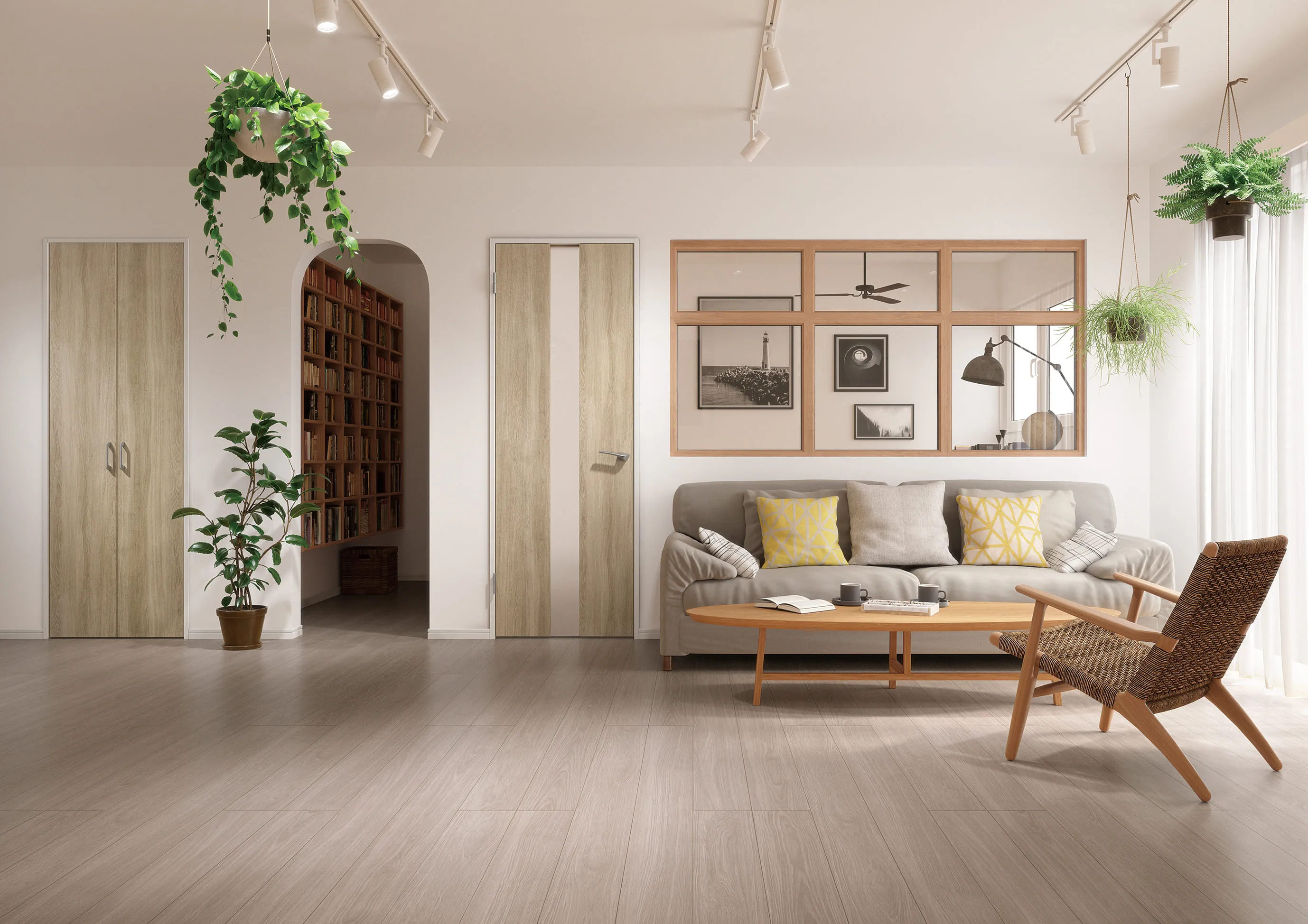 グレージュトーンでまとめられた、観葉植物と調和する落ち着いたリビング空間